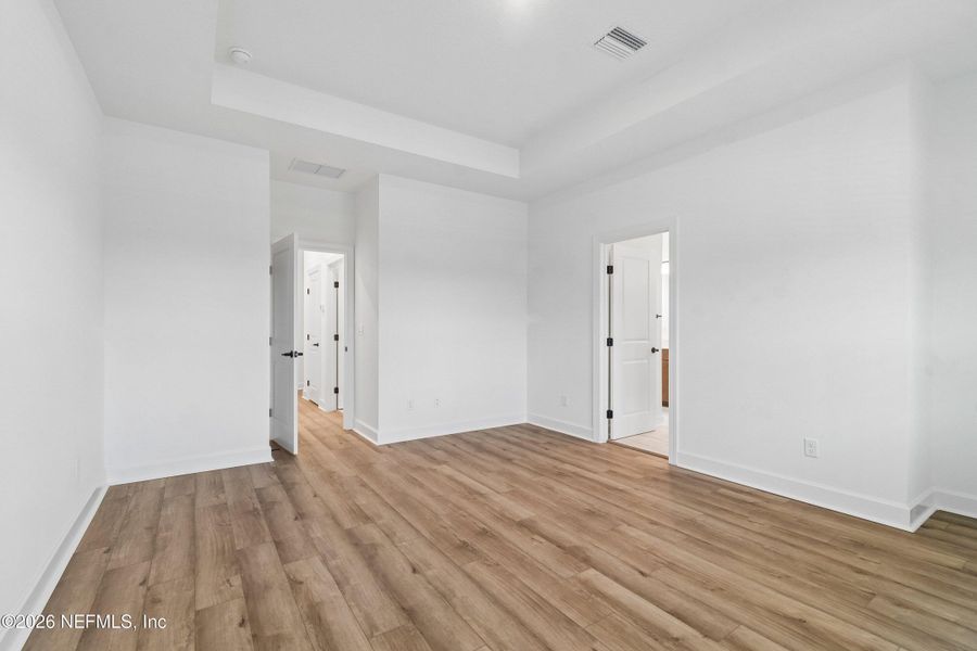 Spacious, unfurnished interior of a new home in Westerly Park at Wildlight - Courtyard Collection, Yulee (Image 21).