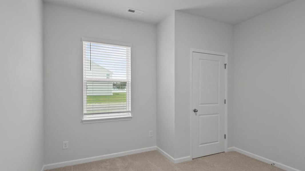 Spacious, unfurnished interior of a new home in Cambridge Park, Mebane (Image 11).