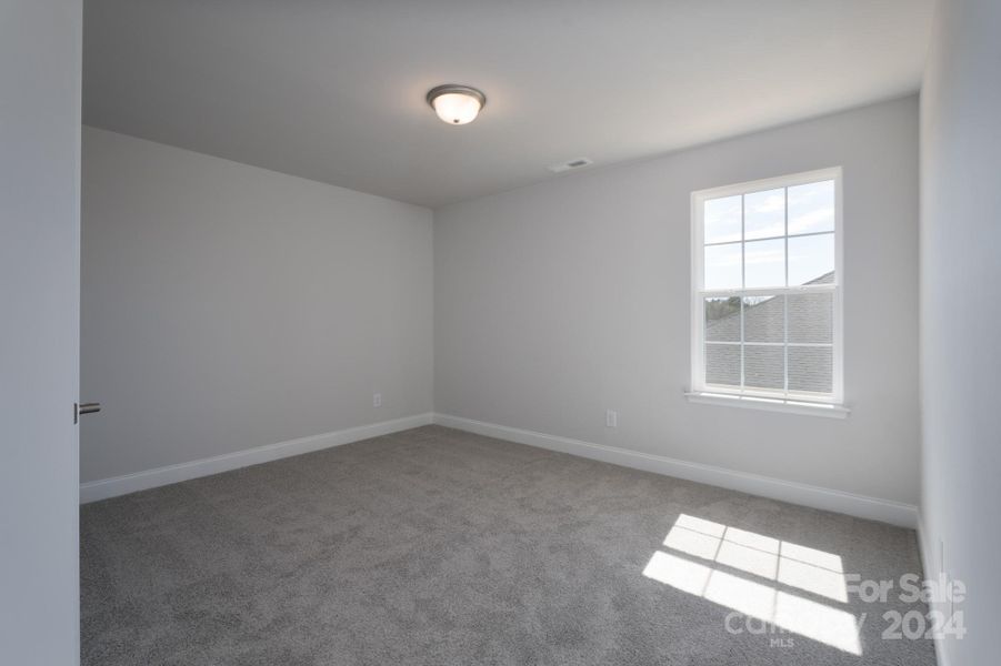 Upstairs Den/Bedroom. Photo representation. Colors and options will differ.