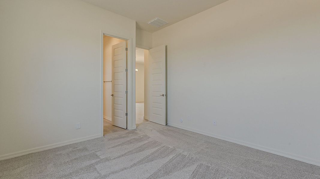 Furnished interior view inside a new home in Windrose, Waddell (Image 36).