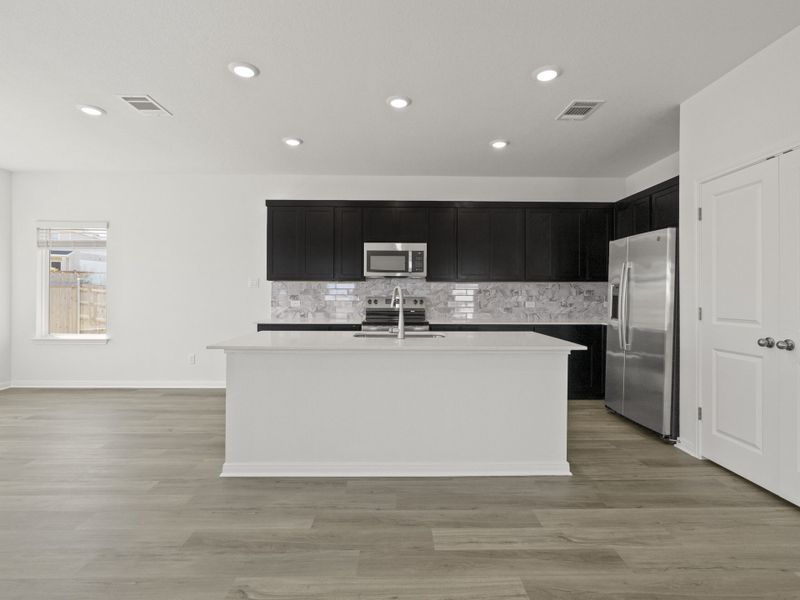 Furnished interior view inside a new home in Cool Water at Sonterra, Jarrell (Image 6).