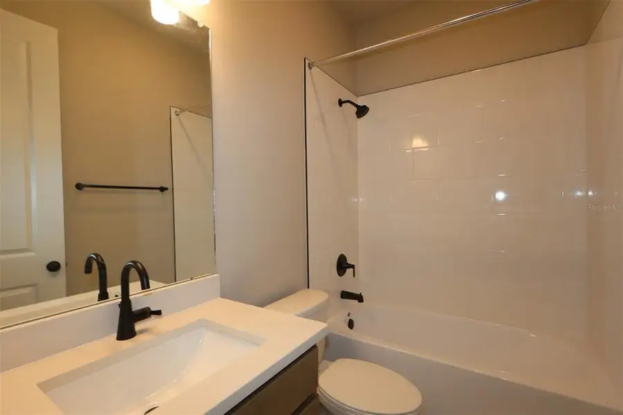 Furnished interior view inside a new home in Waterset Classic Series, Apollo Beach (Image 6).