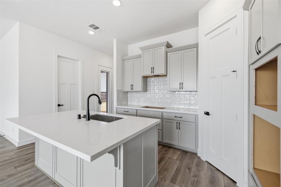 Furnished interior view inside a new home in Bridgeland Central, Cypress (Image 9).