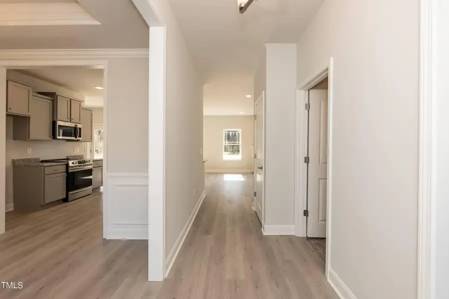 Representative unfurnished interior of a home built from the 2721 by Adams Homes in Hidden Pines, Cameron (Image 11).