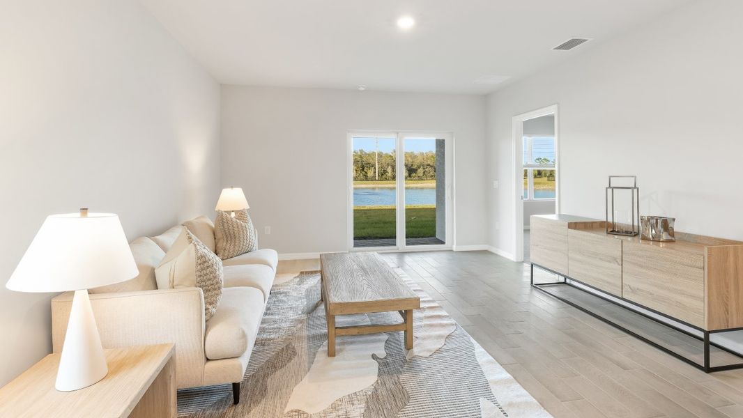 Furnished interior view inside a new home in Bentley Crossing, Fort Myers (Image 3).