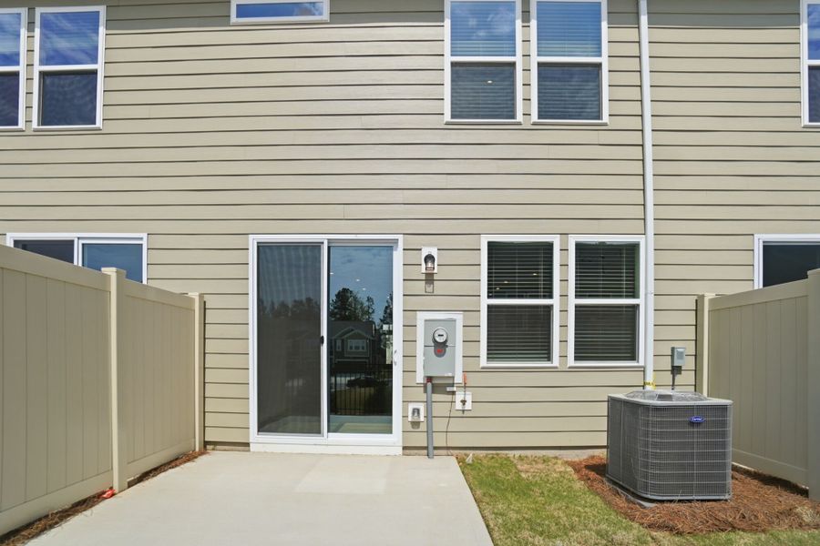 Exterior details and patio area of a home in Arbor Chase, Clover (Image 15).
