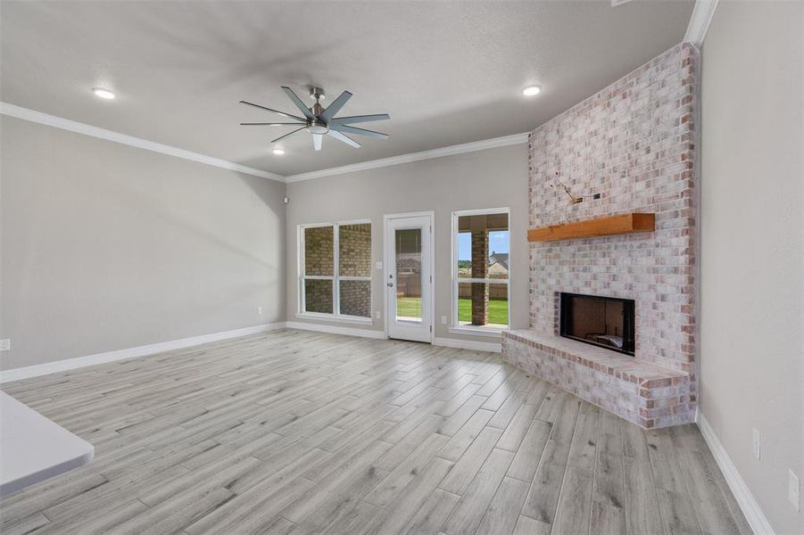 Expansive living area with wood burning fireplace Expansive living area with wood burning fireplace