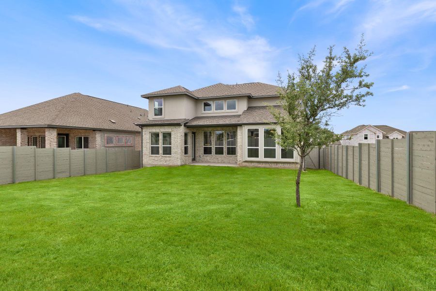 Rear of Home and Private Backyard