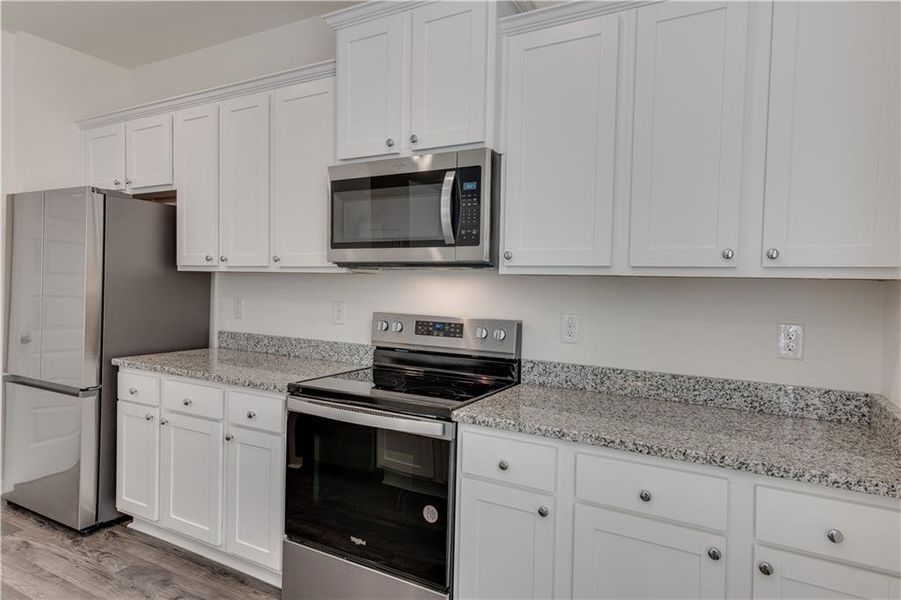 Furnished interior view inside a new home in The Reserve at Calcutta, Stockbridge (Image 19).