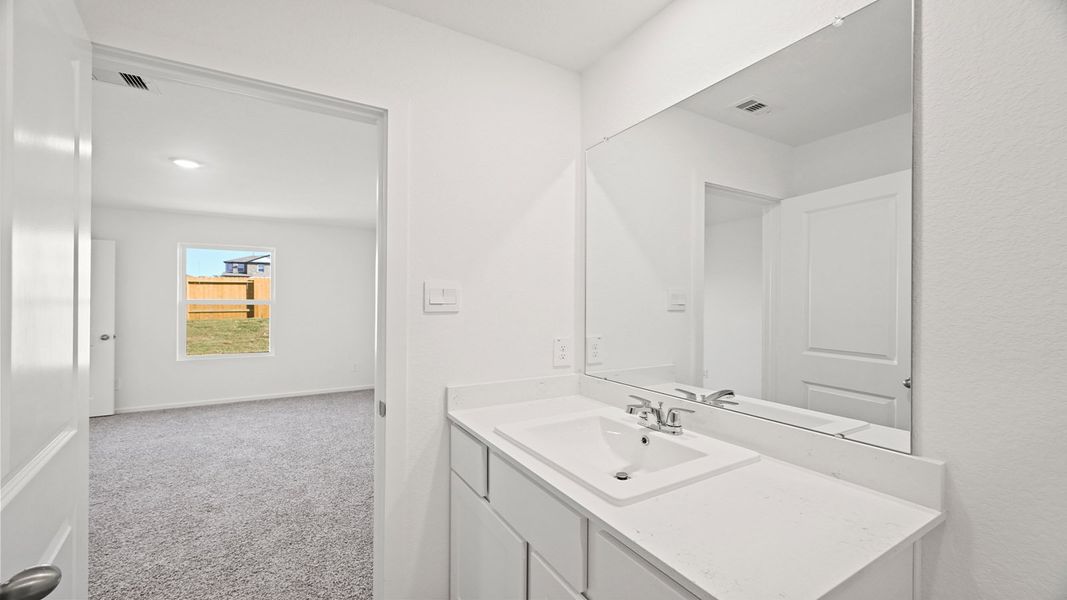 Furnished interior view inside a new home in Westward Pointe, Sealy (Image 9).