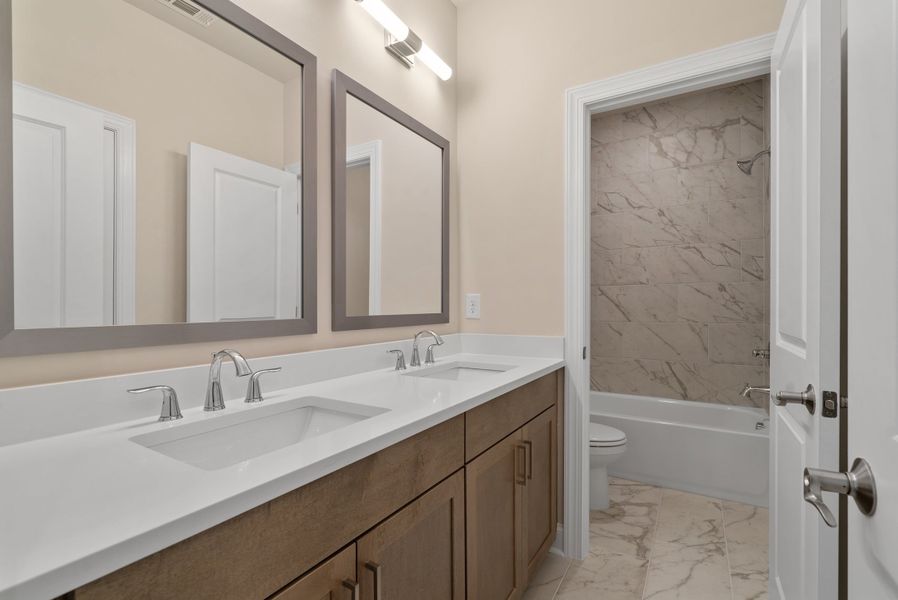 Representative furnished interior of a home built from the The Stafford by The Providence Group in Waterside Single Family, Peachtree Corners (Image 15).