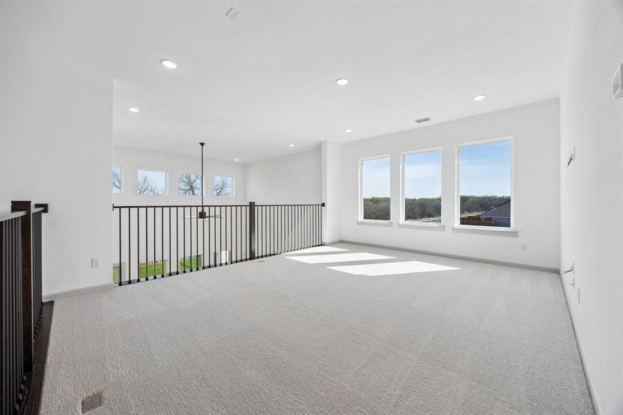Light, bright and open, this lovely game room is the perfect place to host those big game day parties! Light, bright and open, this lovely game room is the perfect place to host those big game day parties!