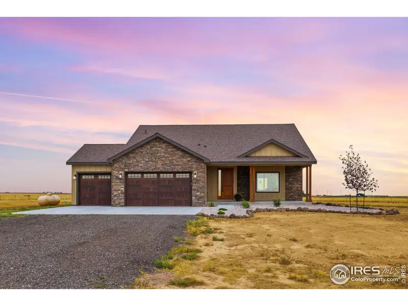 Front exterior of a new home in , Nunn, CO, highlighting curb appeal (Image 1).