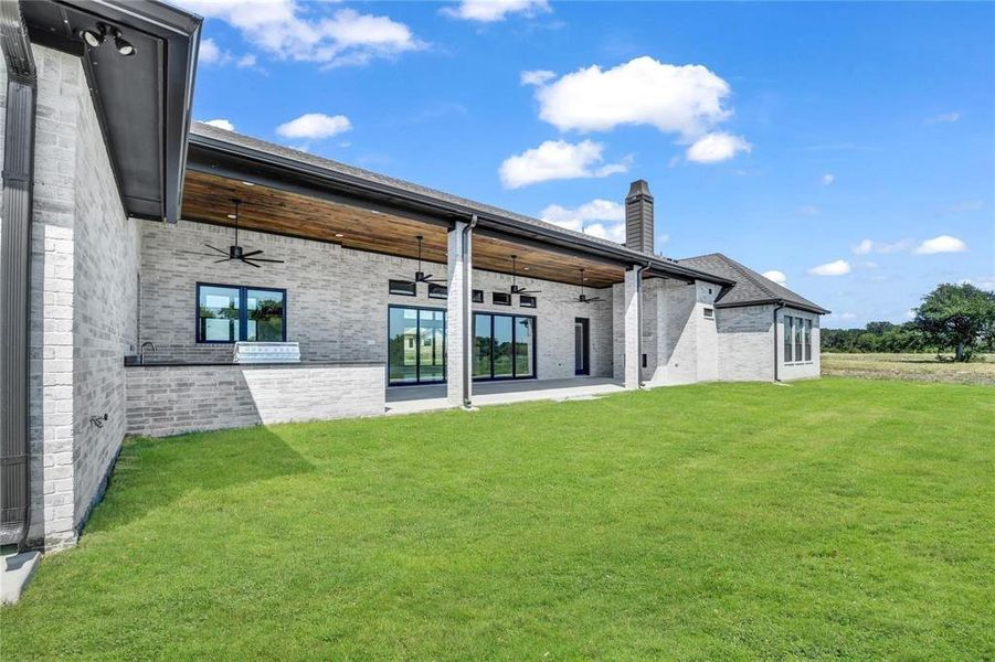 Exterior details and patio area of a home in , Aledo (Image 26).