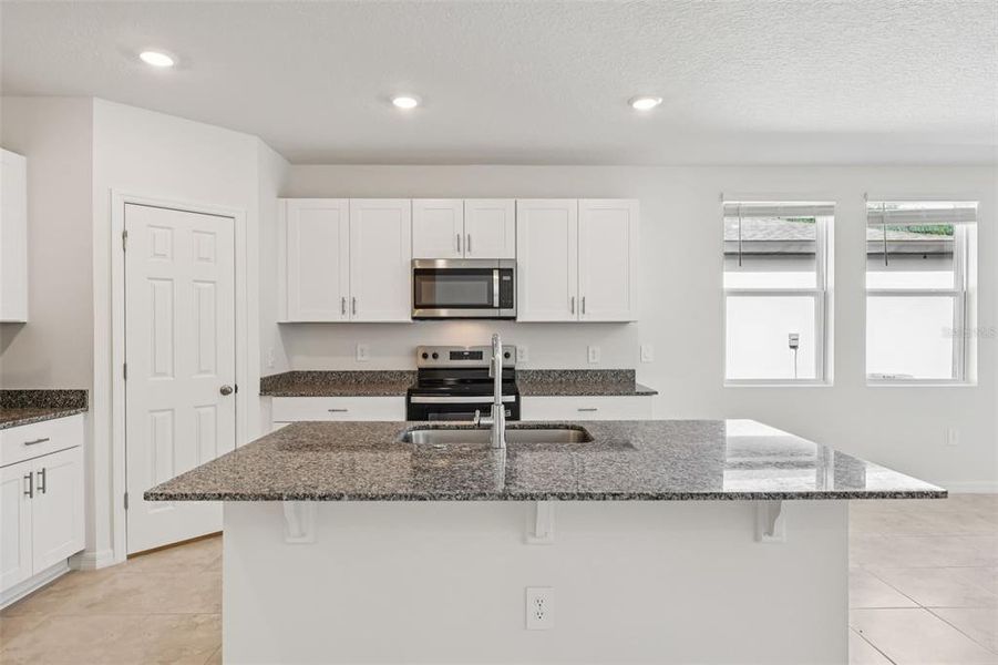 Furnished interior view inside a new home in Bradbury Creek - Signature Series, Haines City (Image 7).