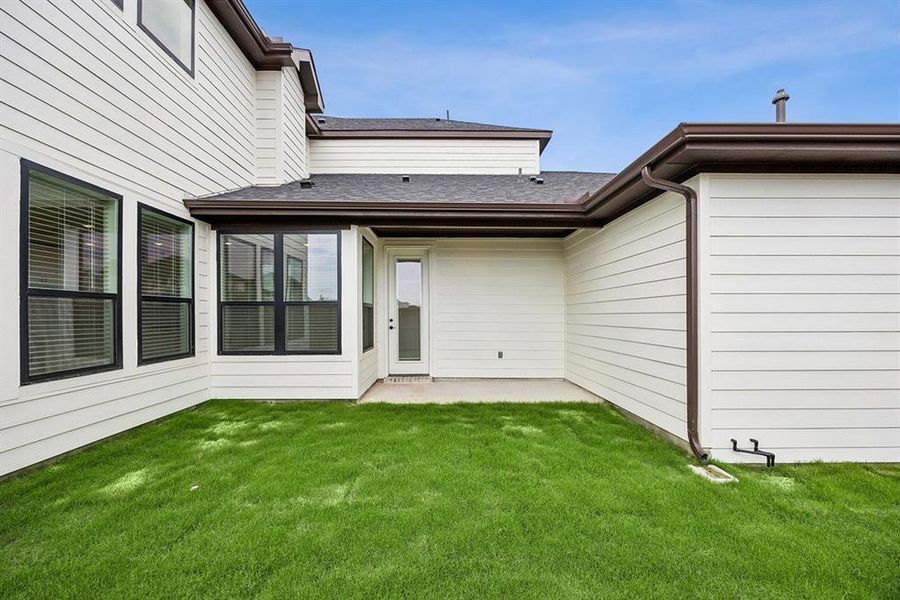 Exterior details and patio area of a home in Fields - East Village, Frisco (Image 3).