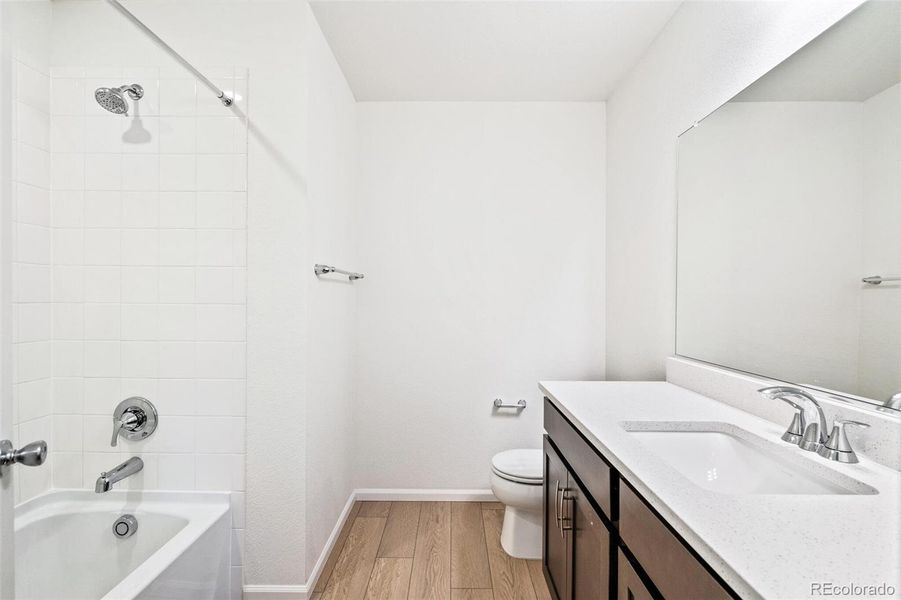 Furnished interior view inside a new home in Turnberry, Commerce City (Image 10).