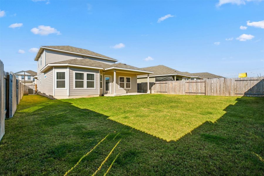 Exterior details and patio area of a home in Butler Farms - Reserve Collection, Liberty Hill (Image 25).