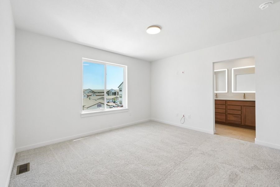 Spacious, unfurnished interior of a new home in The Vistas at West Mesa, Colorado Springs (Image 13).