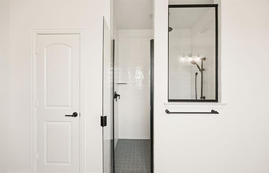 Owner's private featuring a walk-in shower