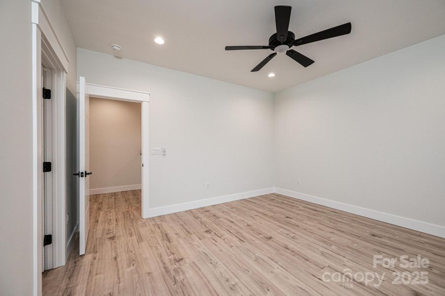 Upstairs #3 Bedroom with Ceiling Fan and Walk in Closet Upstairs #3 Bedroom with Ceiling Fan and Walk in Closet