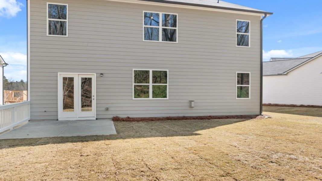 Exterior details and patio area of a home in Liberty Crossing, Braselton (Image 3).
