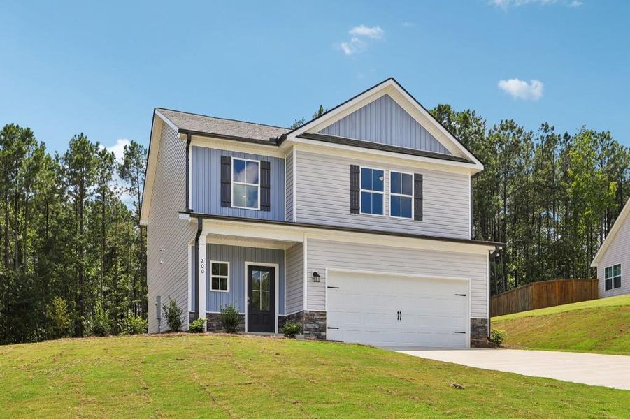 Front exterior of a new home in Savoy Park, Covington, GA, highlighting curb appeal (Image 2). Front exterior of a new home in Savoy Park, Covington, GA, highlighting curb appeal (Image 2).