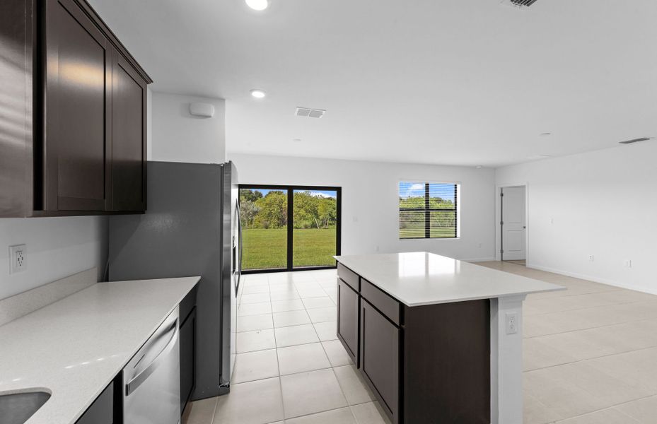 Furnished interior view inside a new home in Caloosa Cove, Labelle (Image 4).