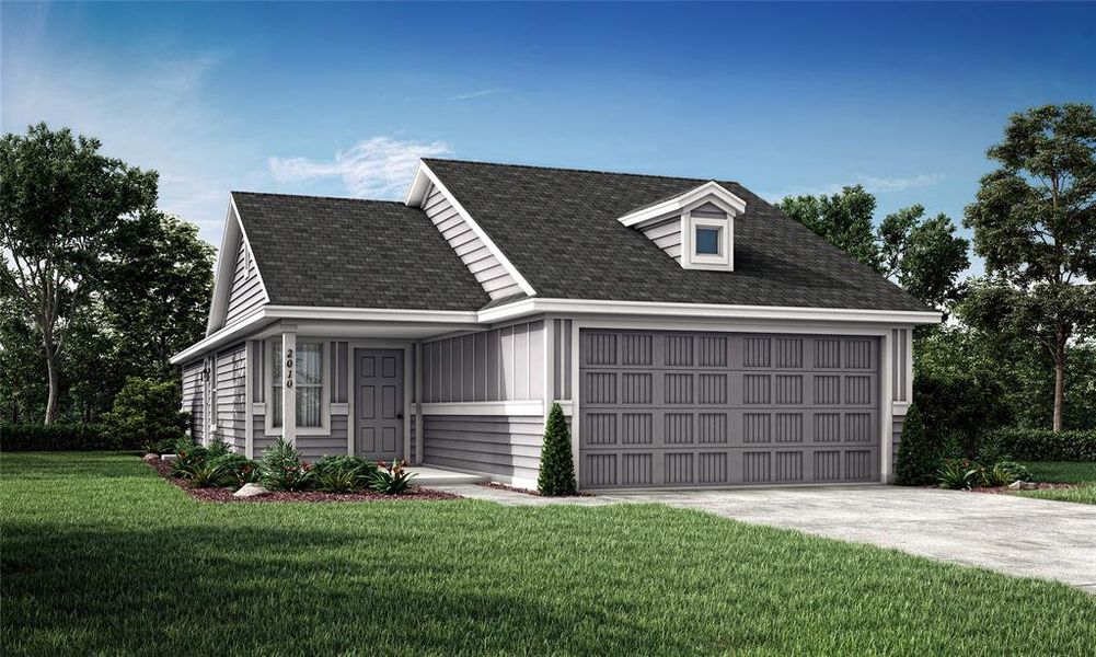 View of front of property with a garage and a front lawn