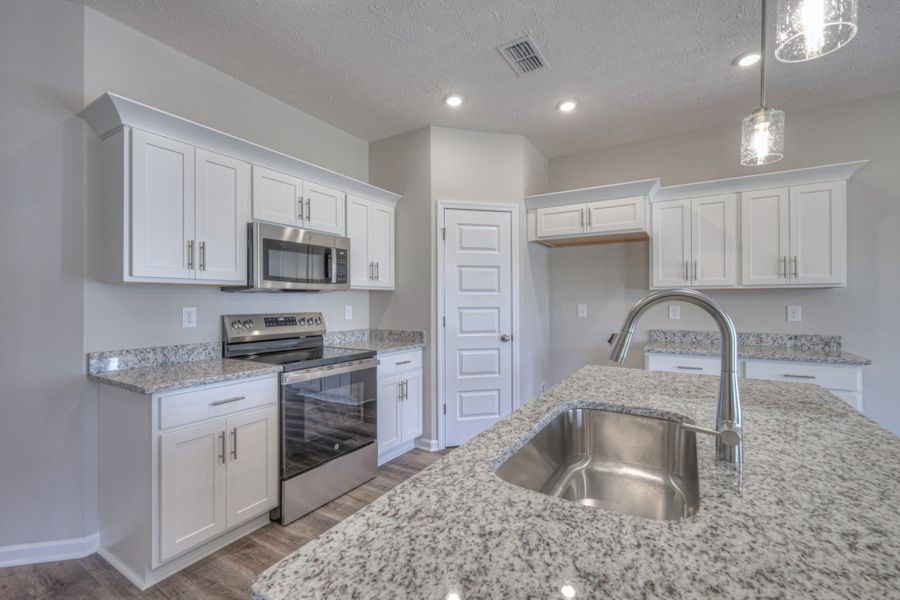 Furnished interior in a model home at Fox Run in Manchester (Image 18).