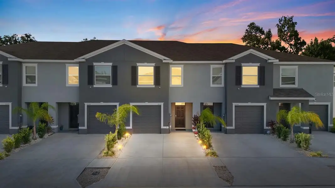 Front exterior of a new home in , Wimauma, FL, highlighting curb appeal (Image 2). Front exterior of a new home in , Wimauma, FL, highlighting curb appeal (Image 2).