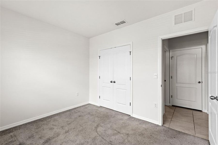 Spacious, unfurnished interior of a new home in Eden Hills, Lake Alfred (Image 22).