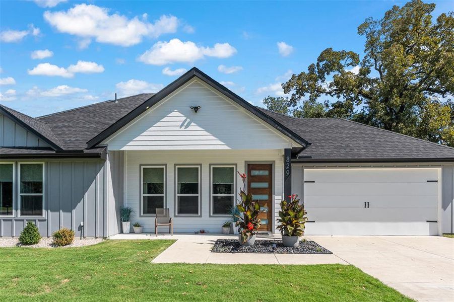 Front exterior of a new home in , Tool, TX, highlighting curb appeal (Image 22). Front exterior of a new home in , Tool, TX, highlighting curb appeal (Image 22).