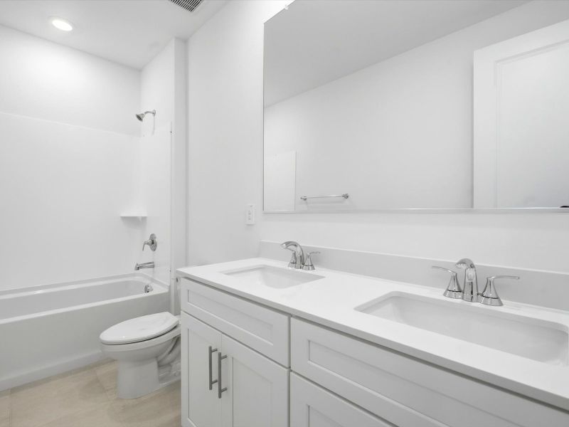 Furnished interior view inside a new home in Legacy Place, Glendale (Image 10).