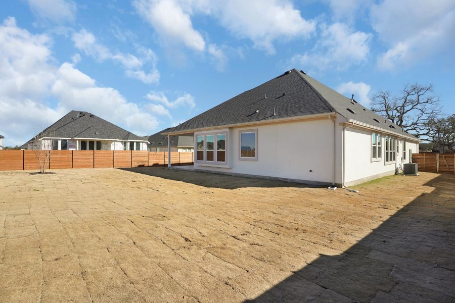 Exterior details and patio area of a home in Broken Oak, Georgetown (Image 35).