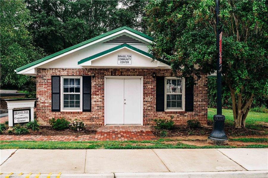 Front exterior of a new home in , Hoschton, GA, highlighting curb appeal (Image 24).