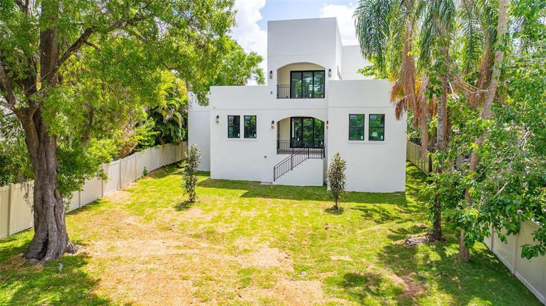 Front exterior of a new home in , Tampa, FL, highlighting curb appeal (Image 27).