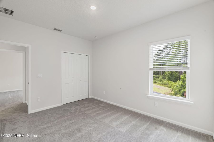 Spacious, unfurnished interior of a new home in Beacon Lake, St. Augustine (Image 24).