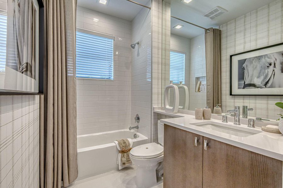 Furnished interior view inside a new home in Apex at Avenir, Palm Beach Gardens (Image 64).