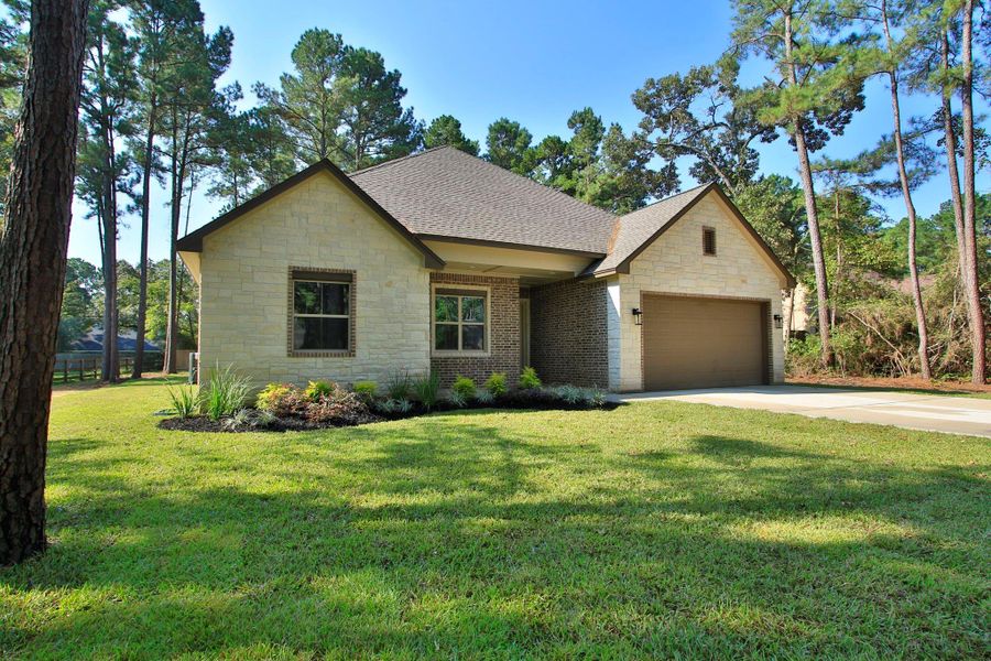 Front exterior of a new home in , Magnolia, TX, highlighting curb appeal (Image 17). Front exterior of a new home in , Magnolia, TX, highlighting curb appeal (Image 17).
