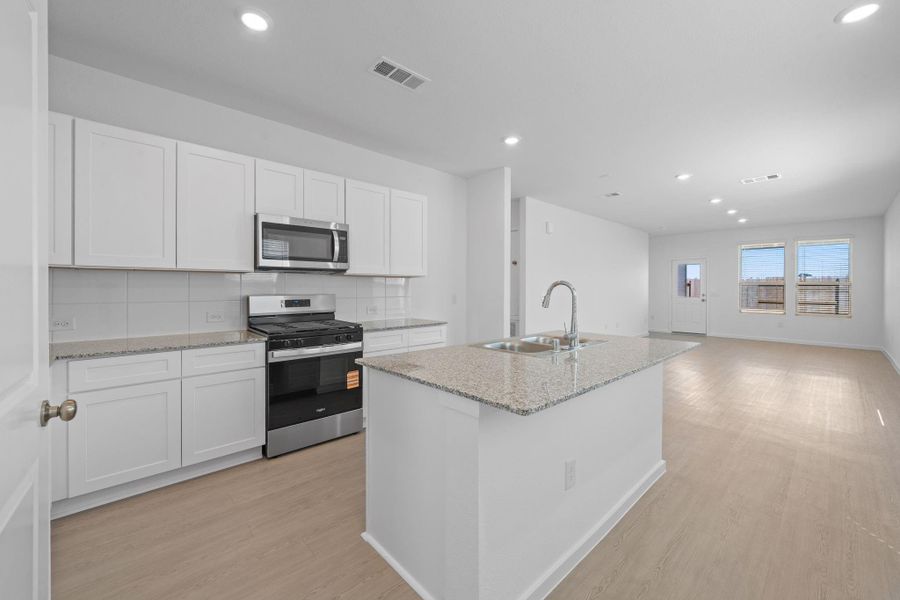Furnished interior view inside a new home in Crosby Farms, Crosby (Image 5). Furnished interior view inside a new home in Crosby Farms, Crosby (Image 5).