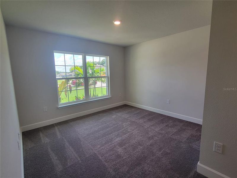 Spacious, unfurnished interior of a new home in Abbey Glen, Dade City (Image 14).