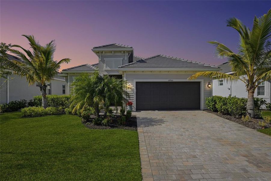 Front exterior of a new home in , Punta Gorda, FL, highlighting curb appeal (Image 2).