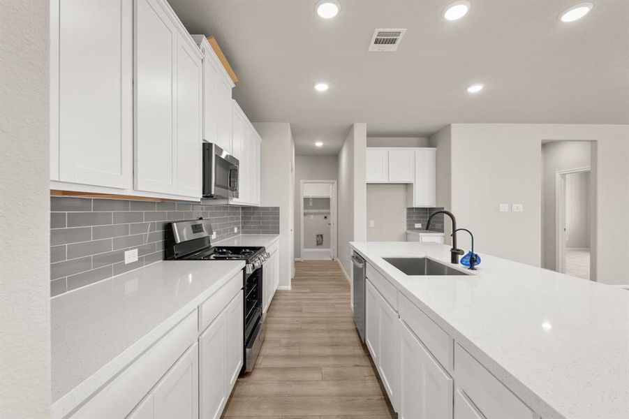 This kitchen is not only a functional space but also has ample storage. Whether you're a seasoned chef or just love to gather and enjoy good food, this kitchen is a dream come true.