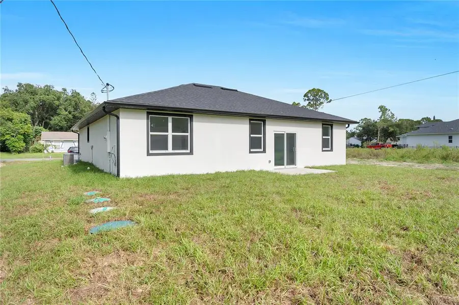 Exterior details and patio area of a home in , Palm Bay (Image 4).