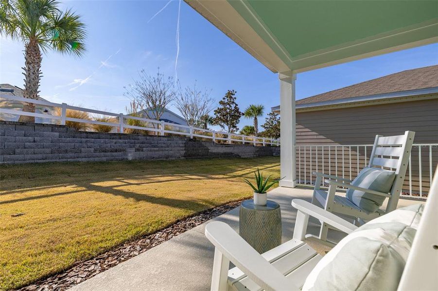 Exterior details and patio area of a home in Green Key Village, Lady Lake (Image 3).