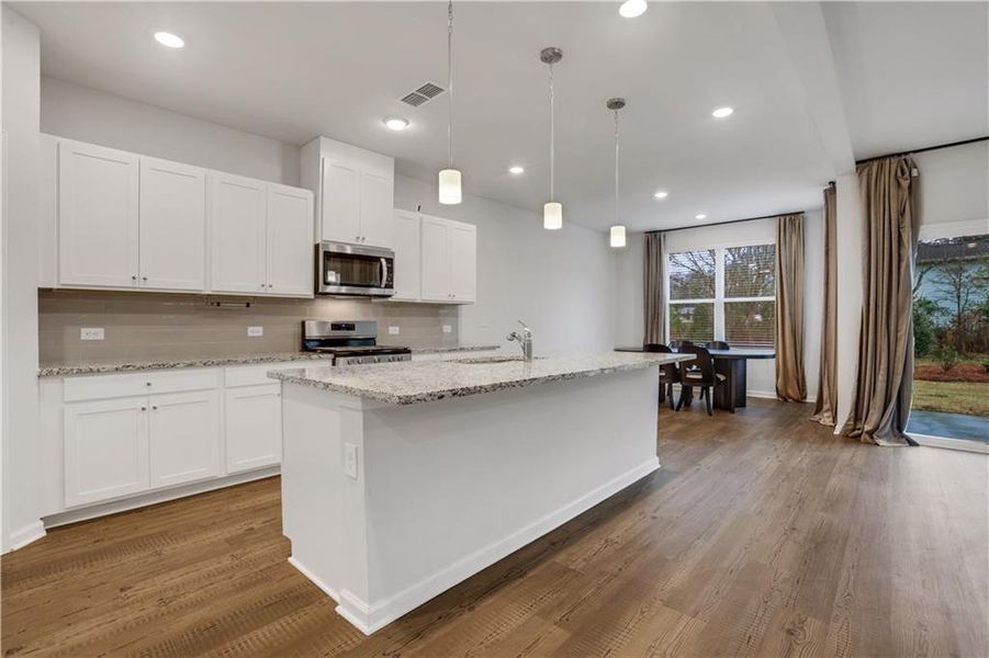 Furnished interior view inside a new home in Graystone Village, Grayson (Image 9). Furnished interior view inside a new home in Graystone Village, Grayson (Image 9).