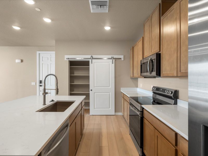 Furnished interior view inside a new home in Gateway Commons, Denver (Image 5).