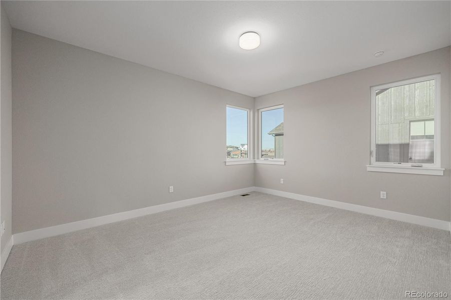 Spacious, unfurnished interior of a new home in West Grange, Longmont (Image 31).
