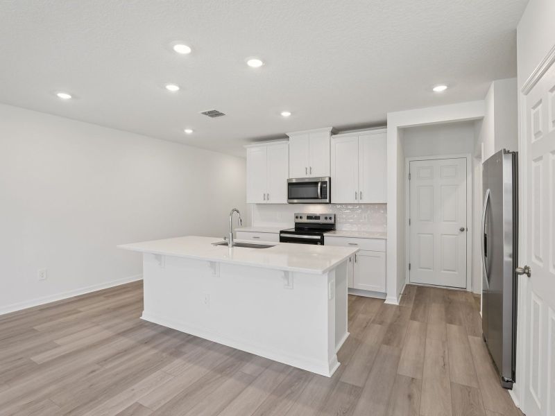 Furnished interior view inside a new home in The Meadow at Crossprairie Townes, St. Cloud (Image 4). Furnished interior view inside a new home in The Meadow at Crossprairie Townes, St. Cloud (Image 4).